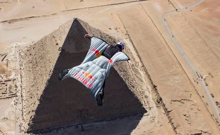 Cedric Dumont makes the first ever wing-suit flight witnessed by the Great Pyramids of Giza