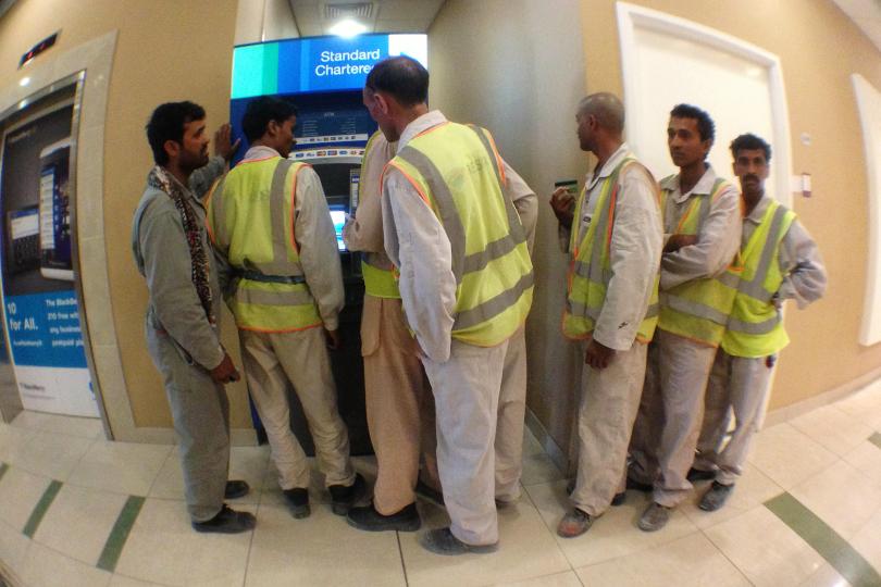 Workers in Qatar start to enjoy benefits of Wage Protection System