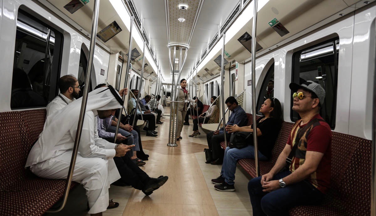 Excited commuters enjoy their first ride on Doha Metro