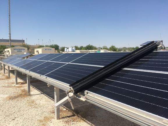 Qatar Environment and Energy Research Institute Project use robots to clean solar panels