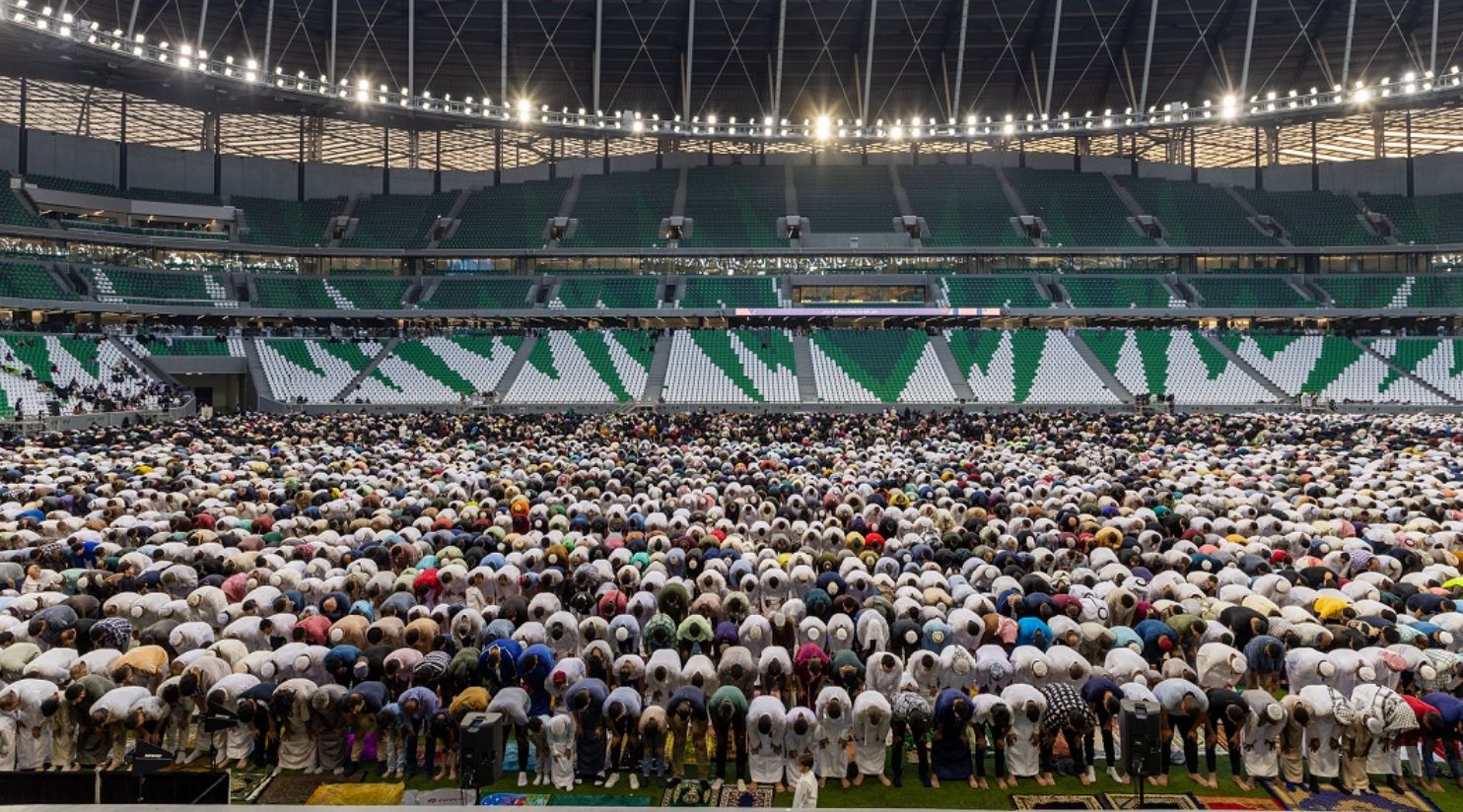 Thousands turn up for the first Eid al-Fitr prayer at Education City Stadium on Friday