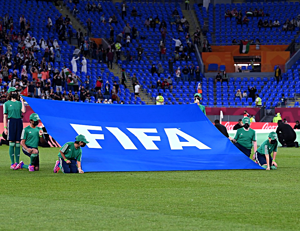 QF youth serve as flag bearers during the FIFA Arab Cup 2021